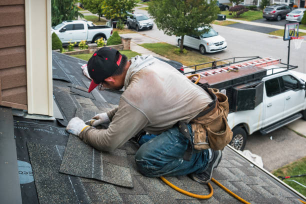 Professional Flat Roof Repair technician working in Ashville, PA